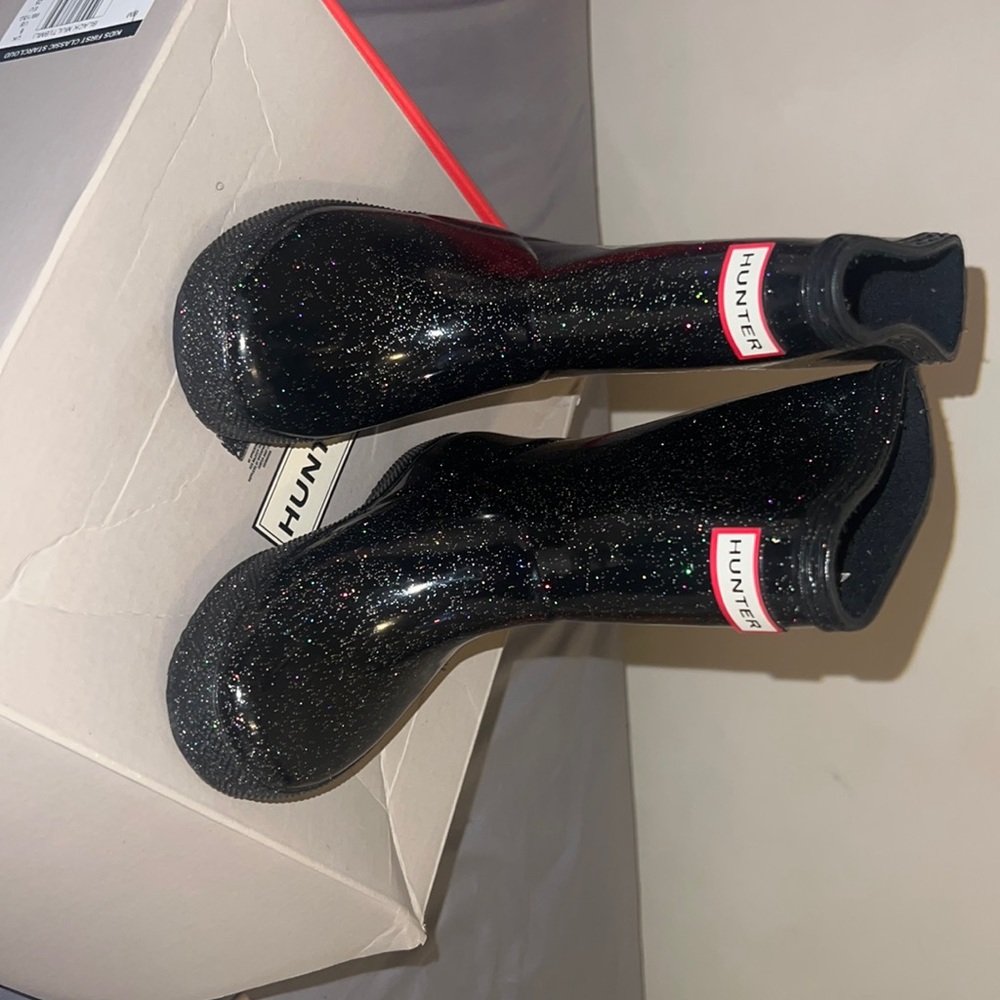 Glitter black hunter rain boots . Excellent condition !